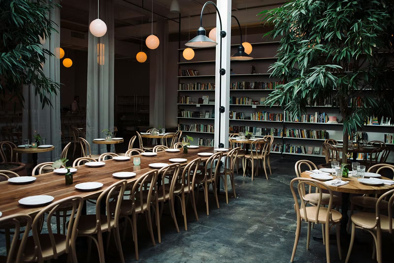 The library-inspired dining room at Brewery Bhavana in Raleigh