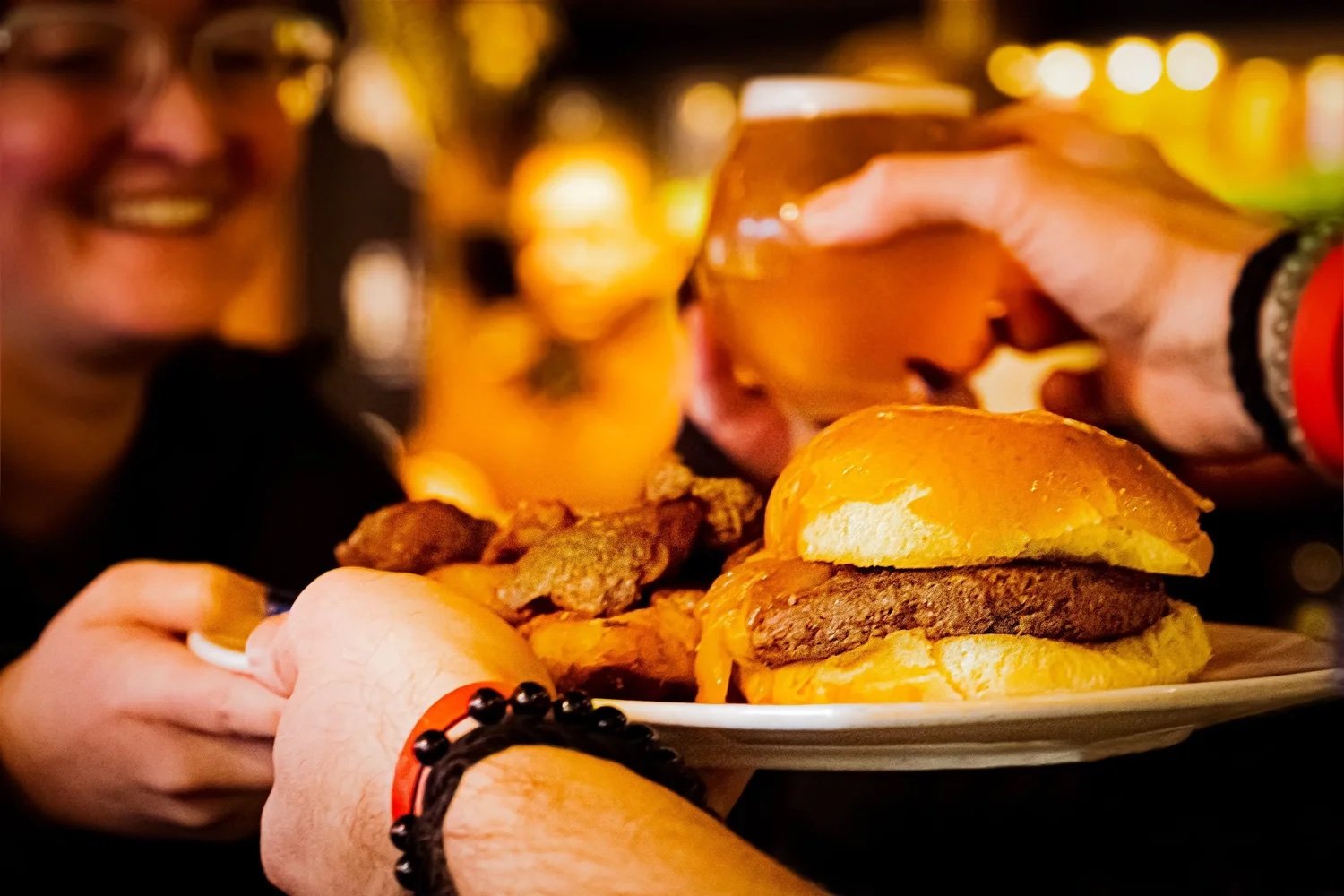 A burger and beers being served at Brier Creek Beer Garden