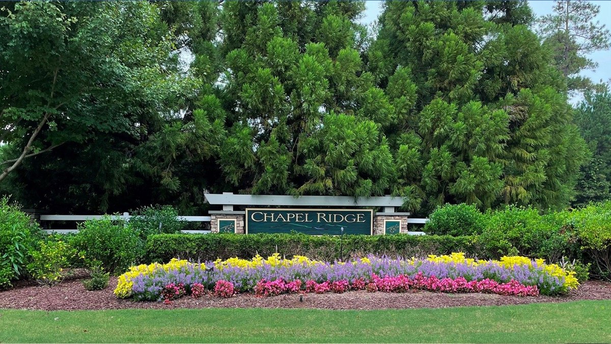 The landscaped entrance sign at Chapel Ridge in Pittsboro