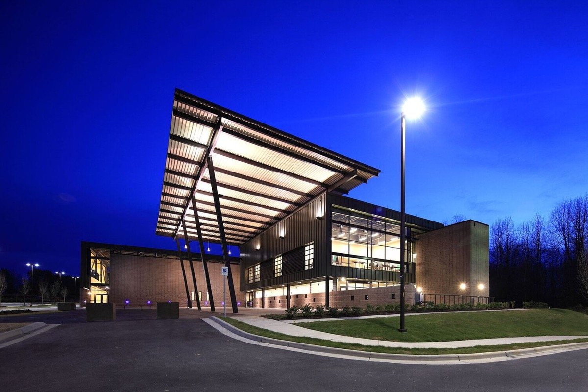 Clayton Community Center exterior illuminated at dusk