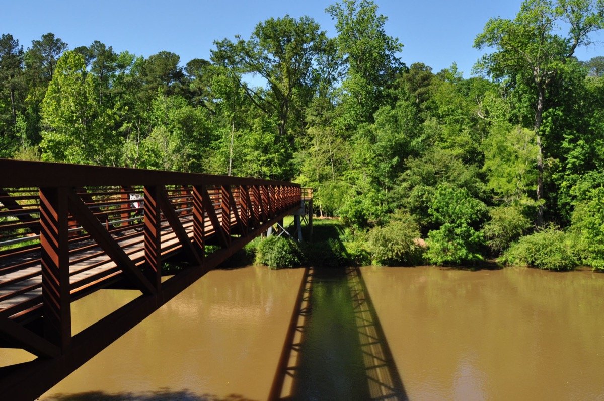 Pedestrian bridge crossing the Neuse River along Clayton River Walk