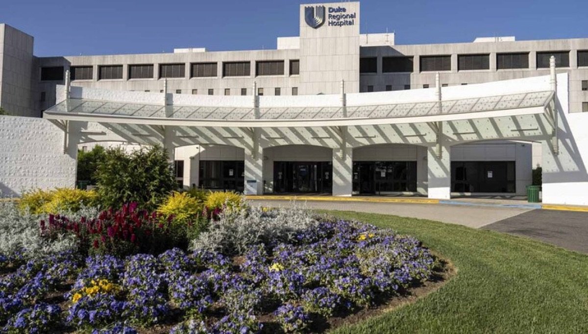 Duke Regional Hospital entrance with a landscaped flower garden