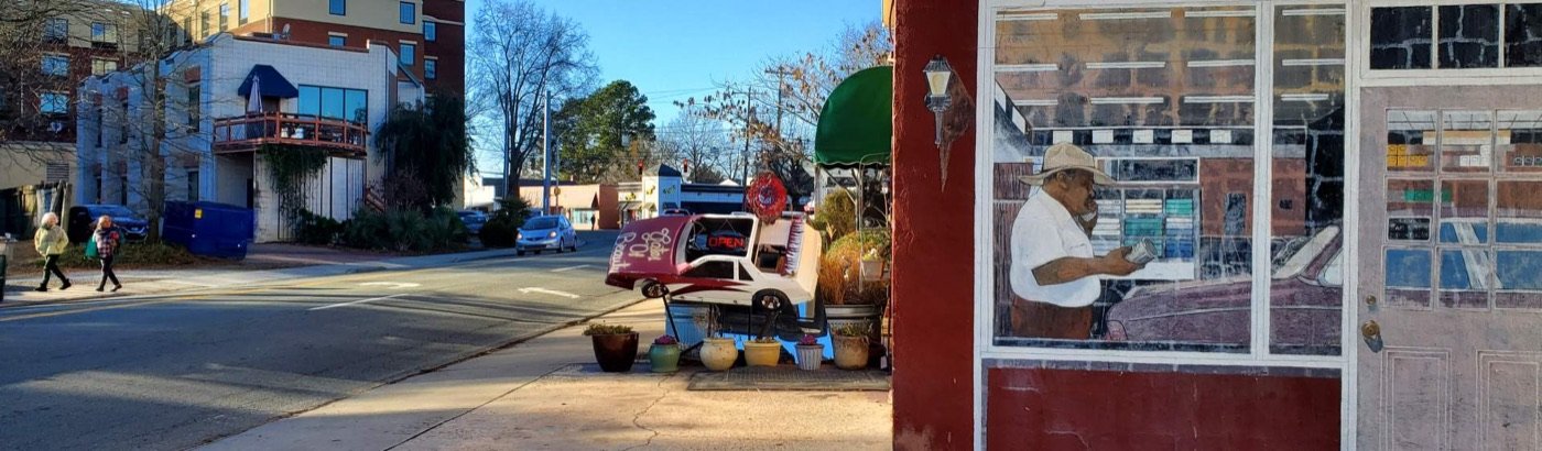 Colorful local storefront where West Franklin Street meets East Main Street in Carrboro