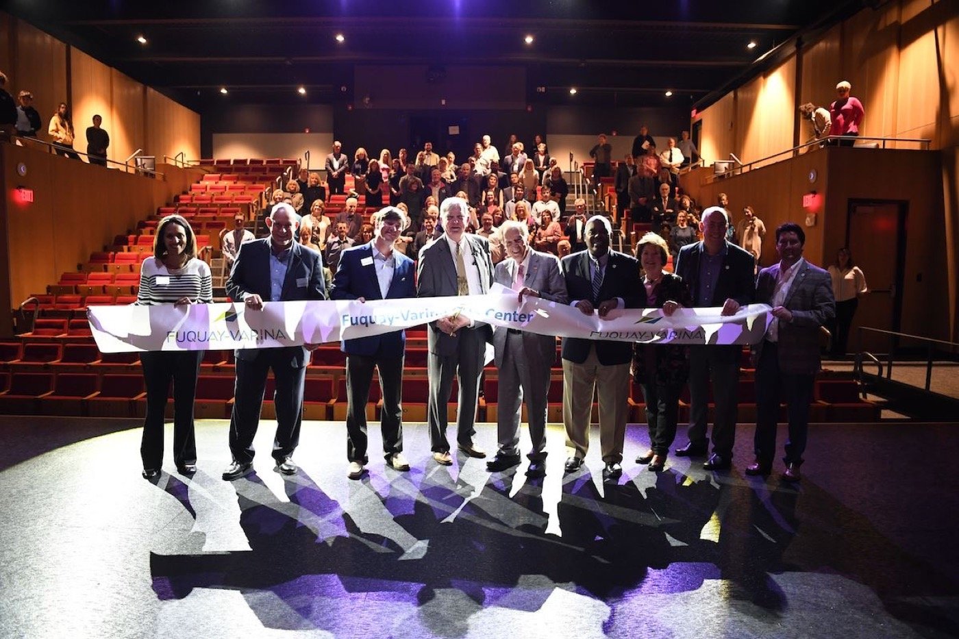 Community ribbon cutting inside the Fuquay-Varina Arts Center theater