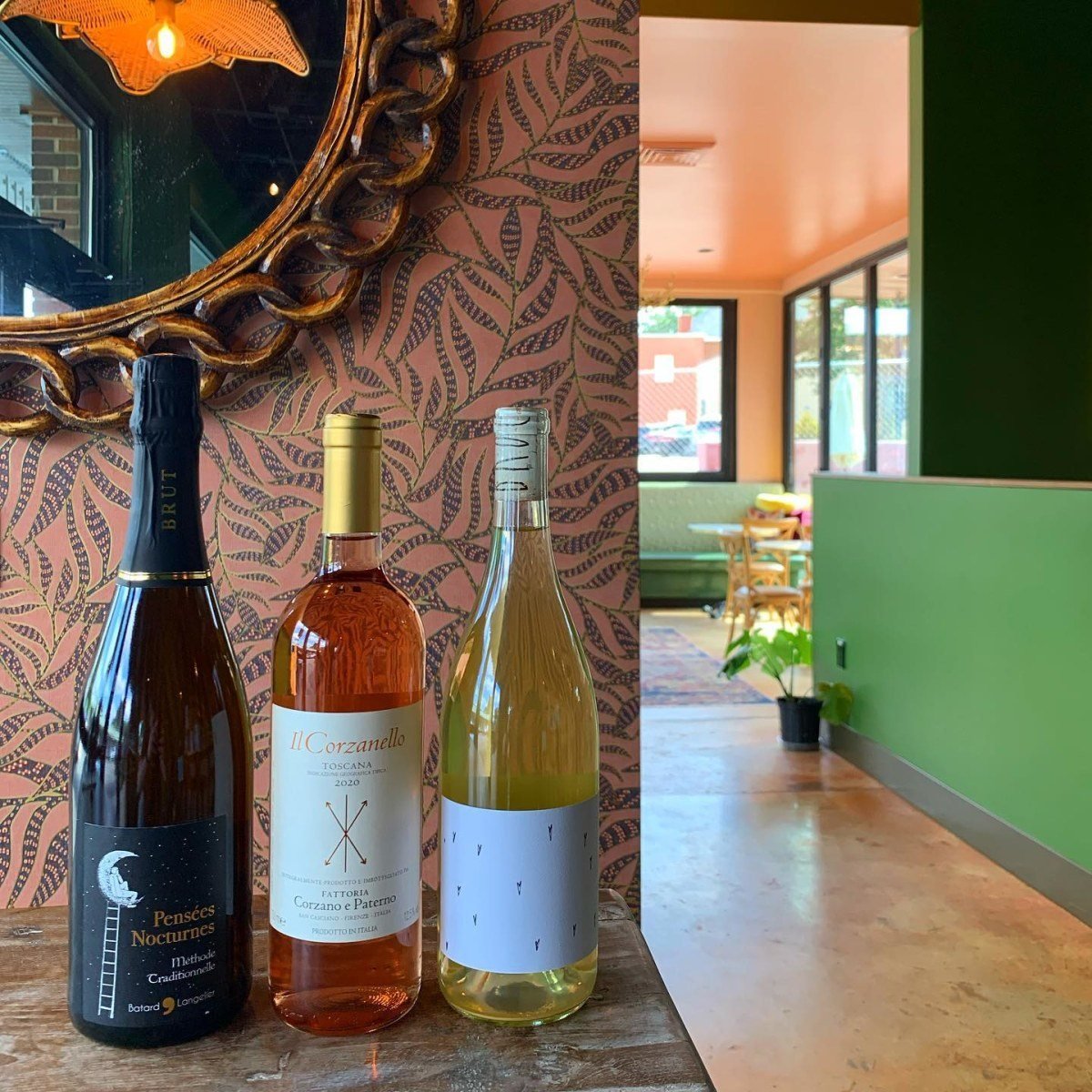 Wine bottles and the colorful interior at Hank’s Downtown Dive