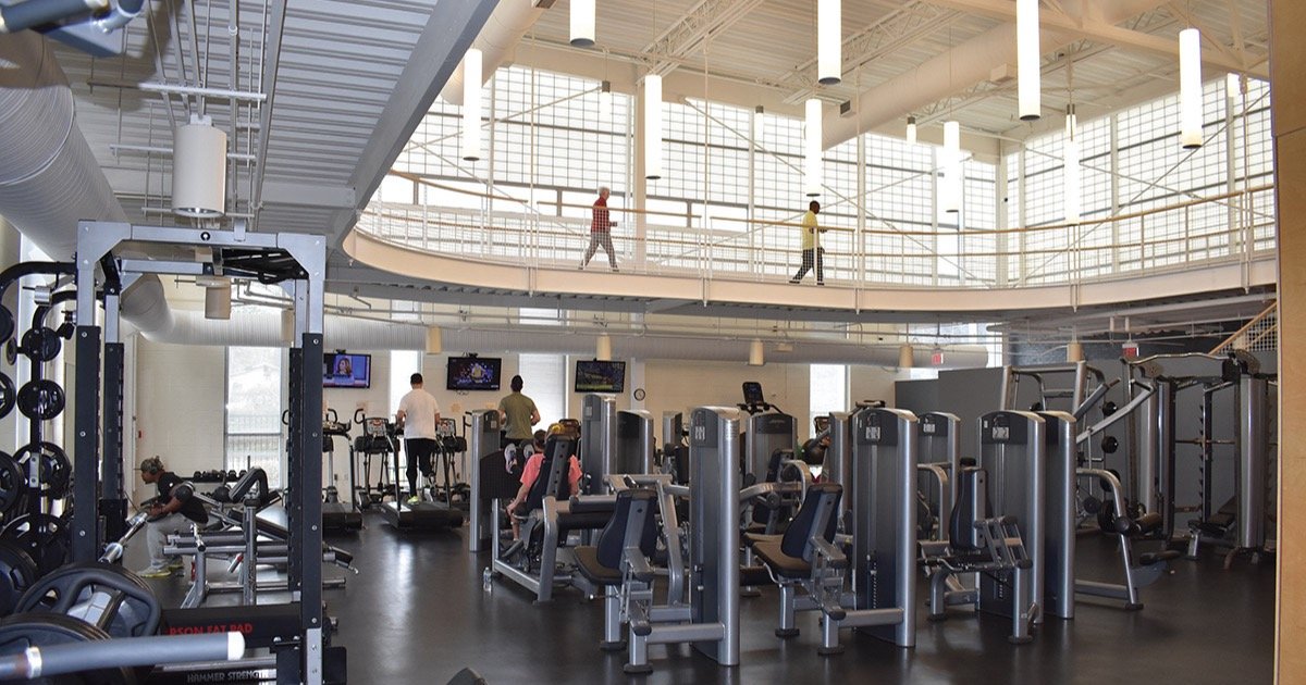 Fitness equipment and elevated indoor walking track at Hunt Recreation Center