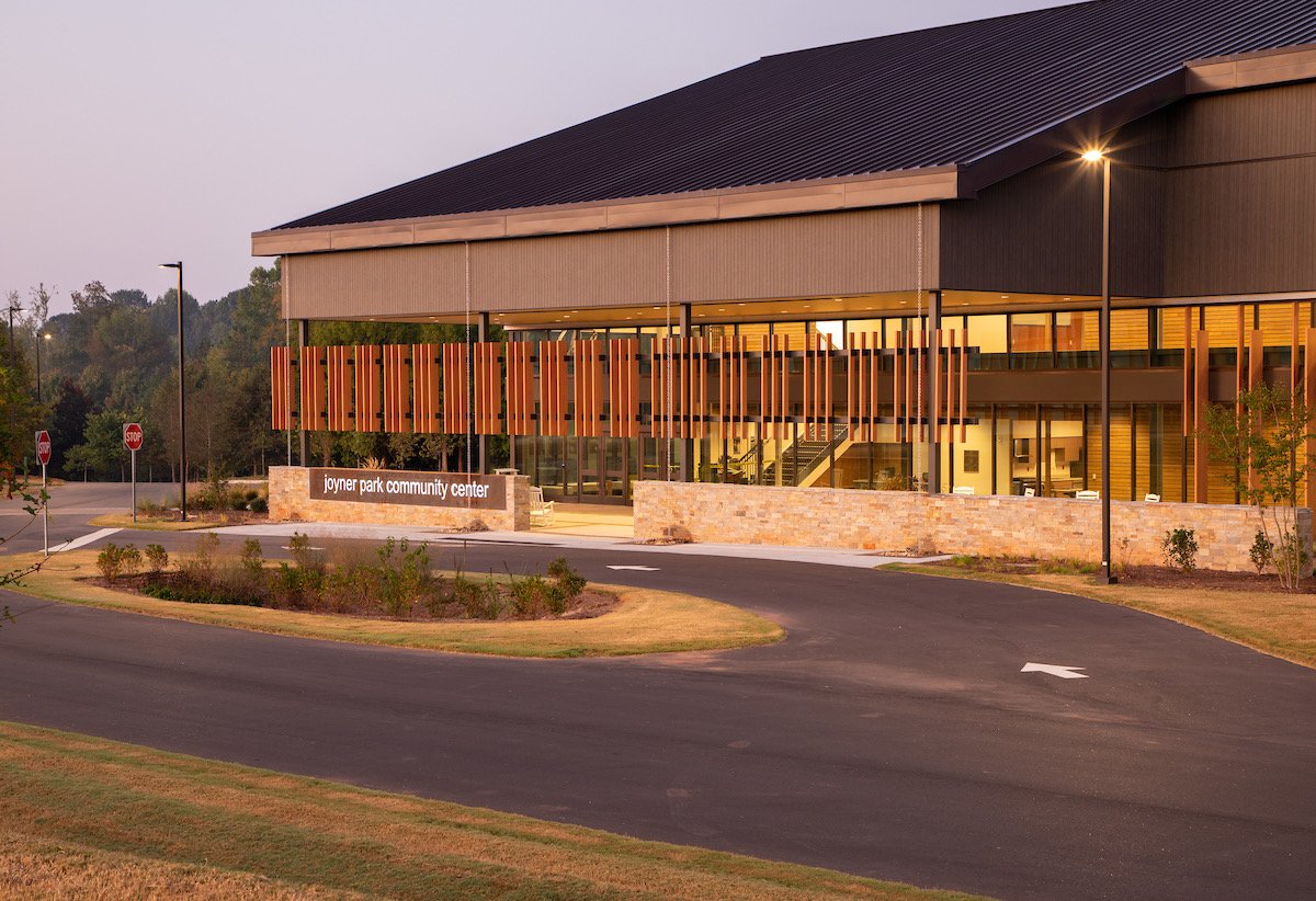 Joyner Park Community Center illuminated in the early evening