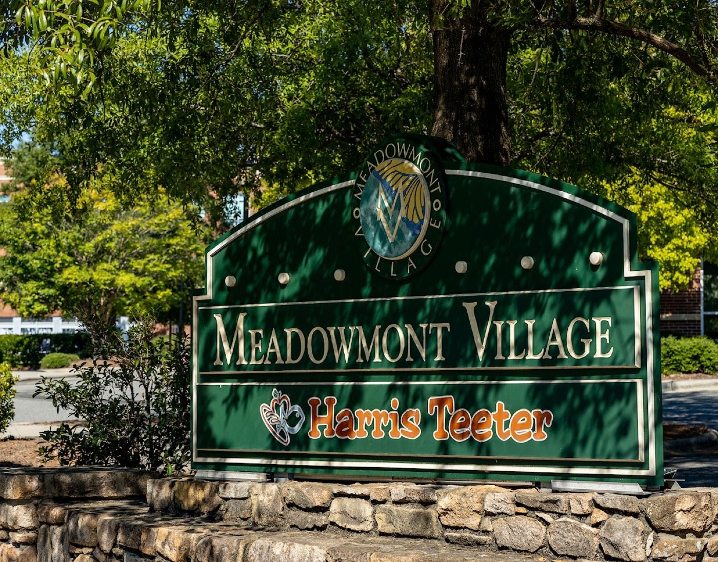 Landscaped Meadowmont Village entrance sign in Chapel Hill