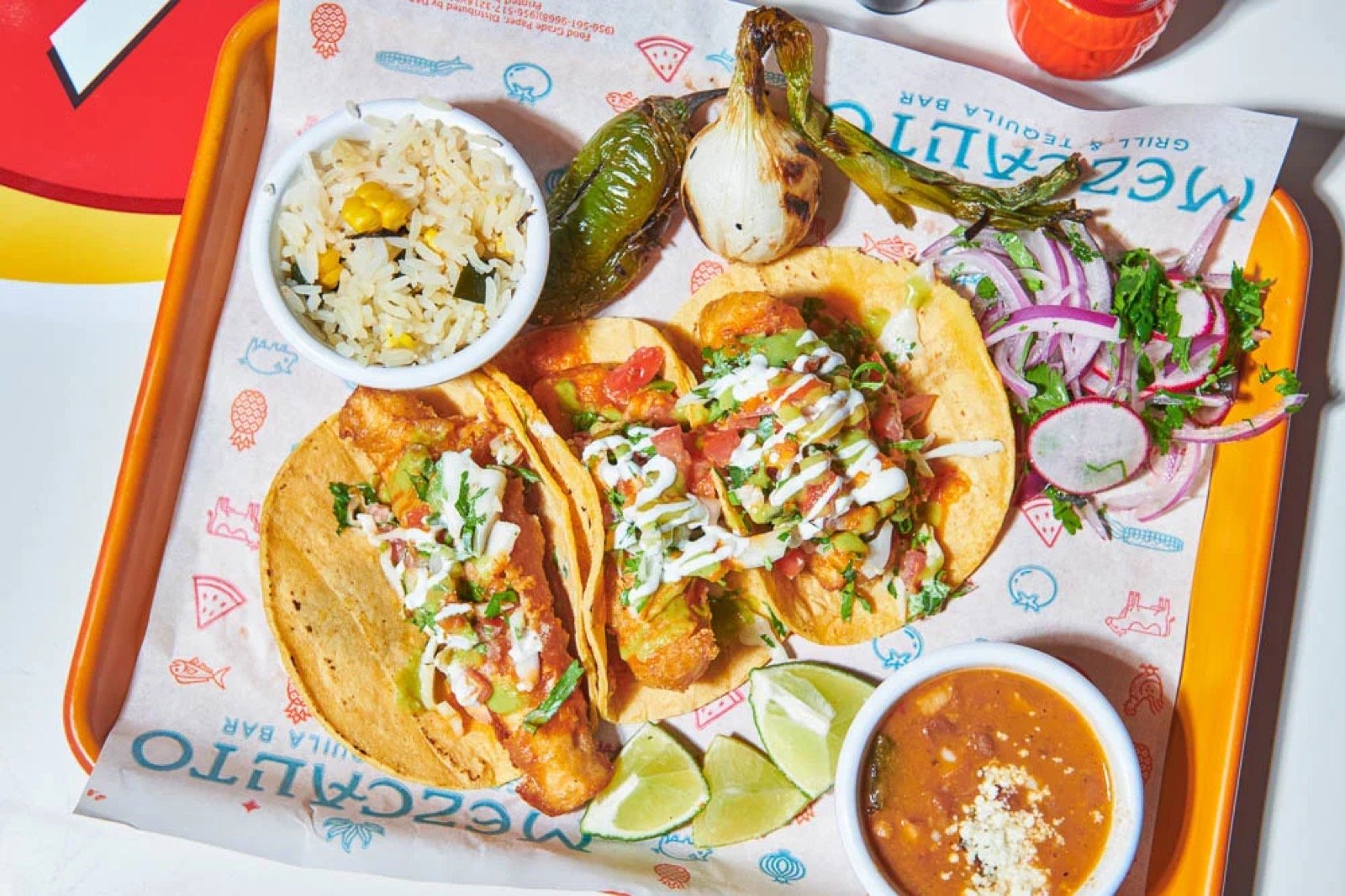 Colorful Mexican dishes and tacos from Mezcalito
