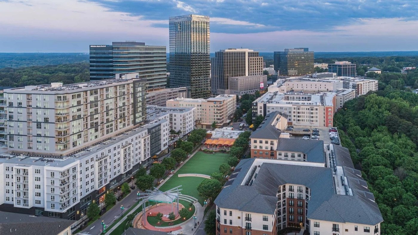 Modern shops, restaurants, and pedestrian plaza at North Hills in Raleigh