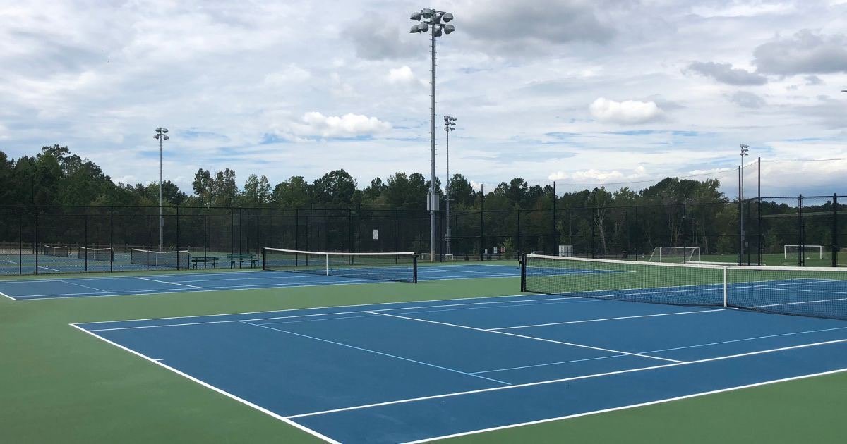 Blue tennis and pickleball courts at North Main Athletic Complex