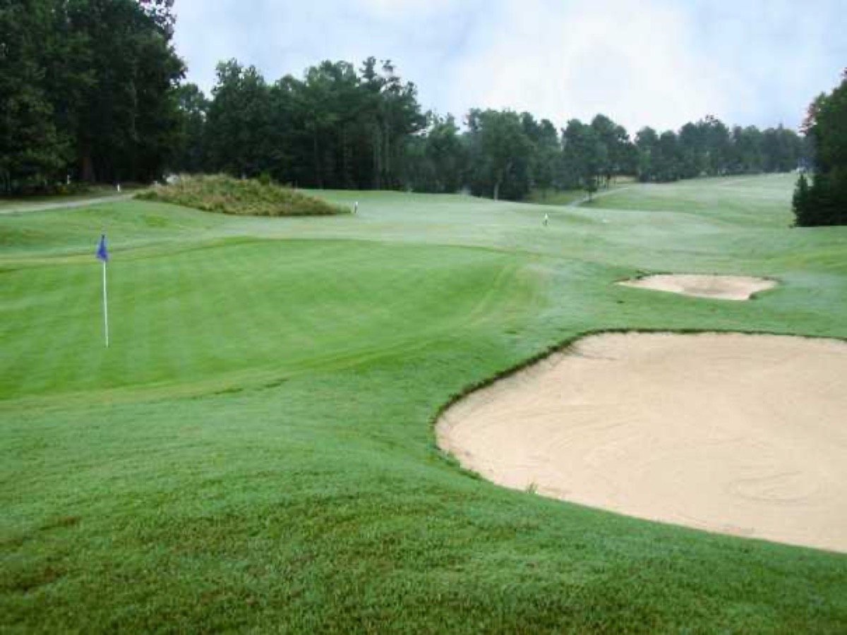 A green and sand bunkers at Riverwood Golf Club in Clayton