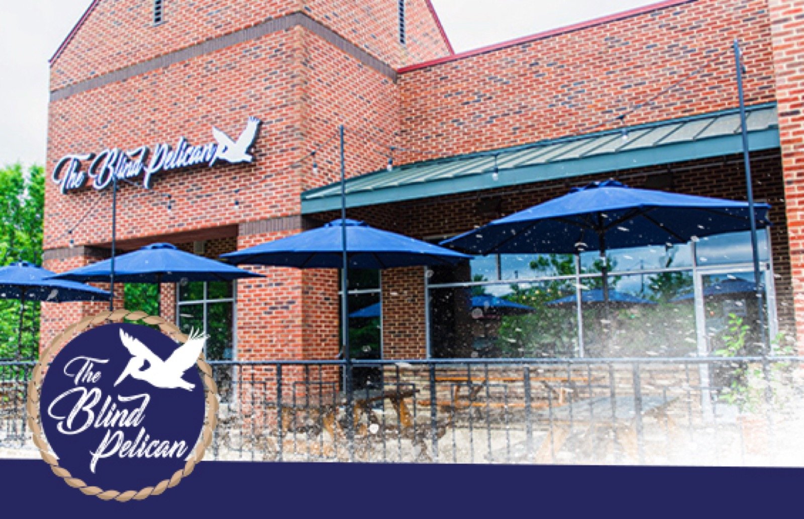 The brick exterior and patio of The Blind Pelican Seafood Company