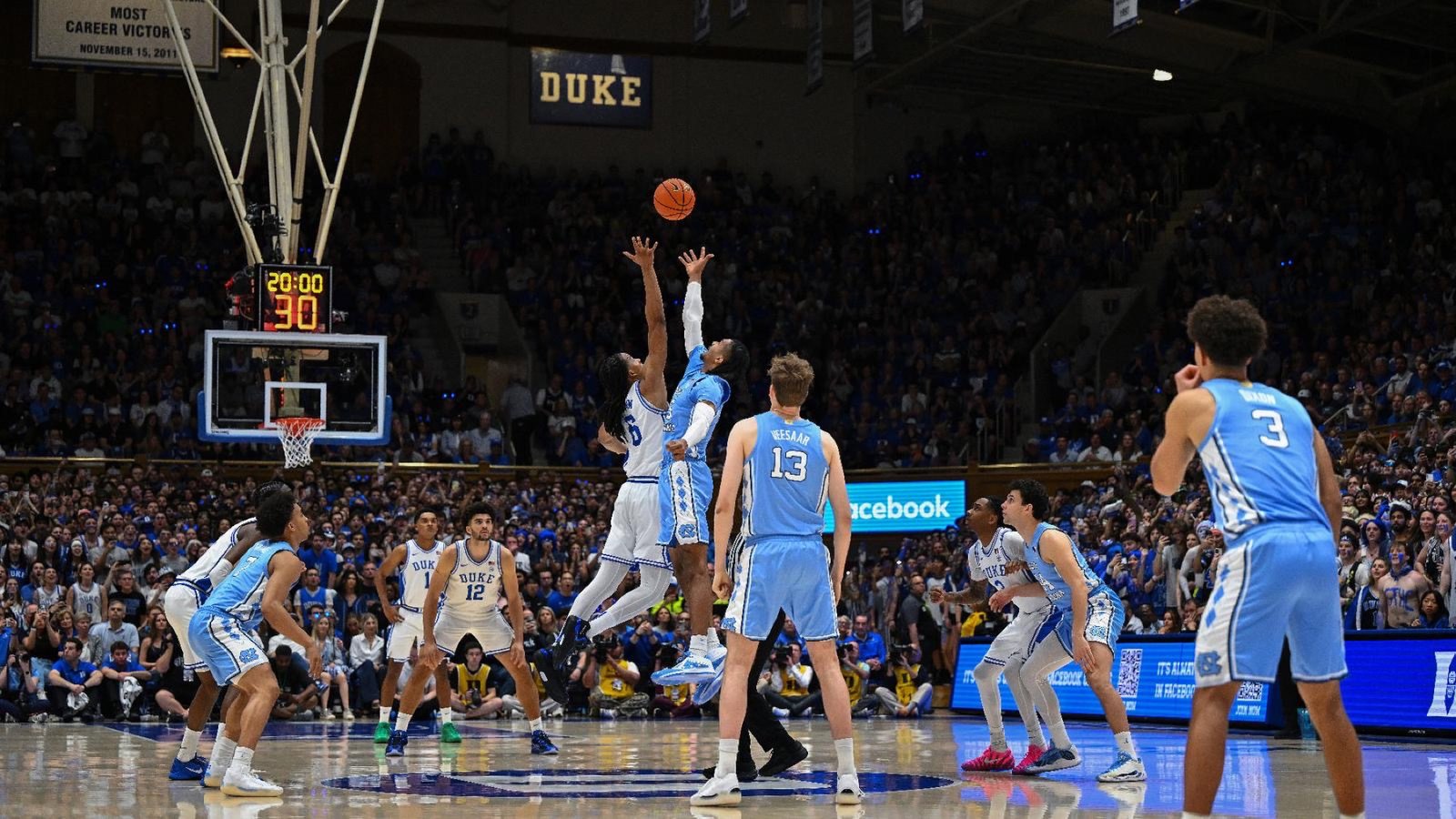 Duke and North Carolina basketball teams playing at Cameron Indoor Stadium