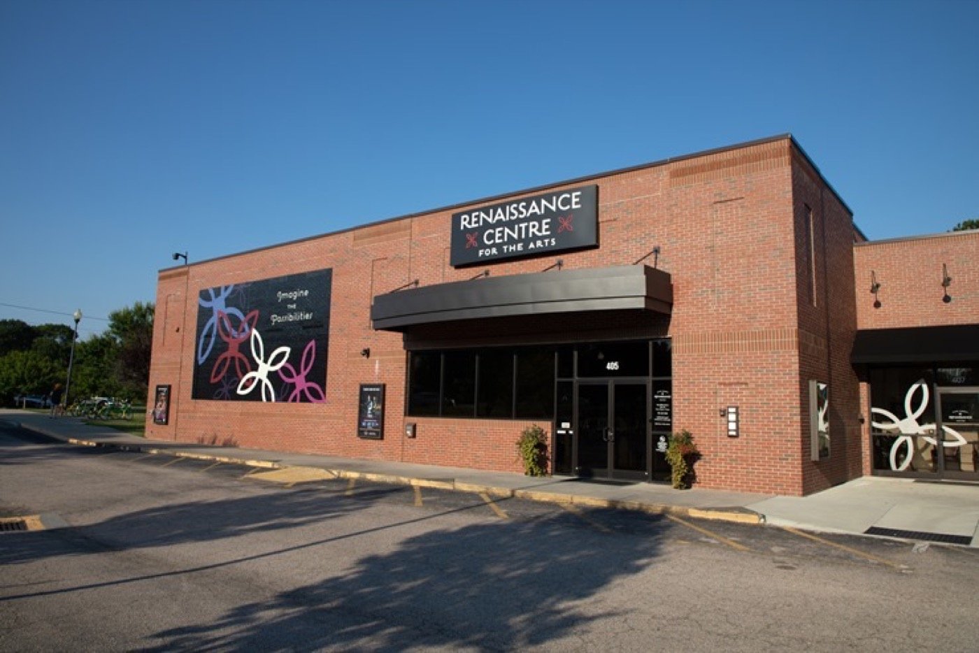 Brick exterior and colorful mural at the Wake Forest Renaissance Centre