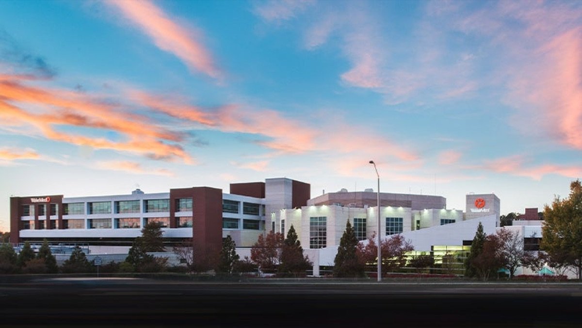 WakeMed Cary Hospital exterior beneath a colorful evening sky