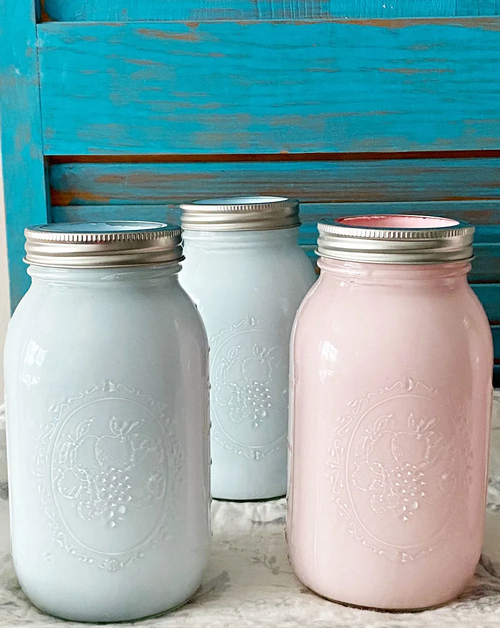 Leftover paint stored in sealed mason jars